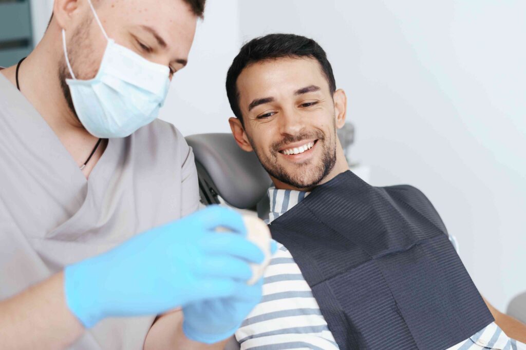 Smiling patient during a dental visit.